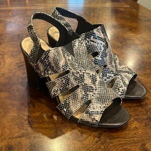 Abella snake print sandals.